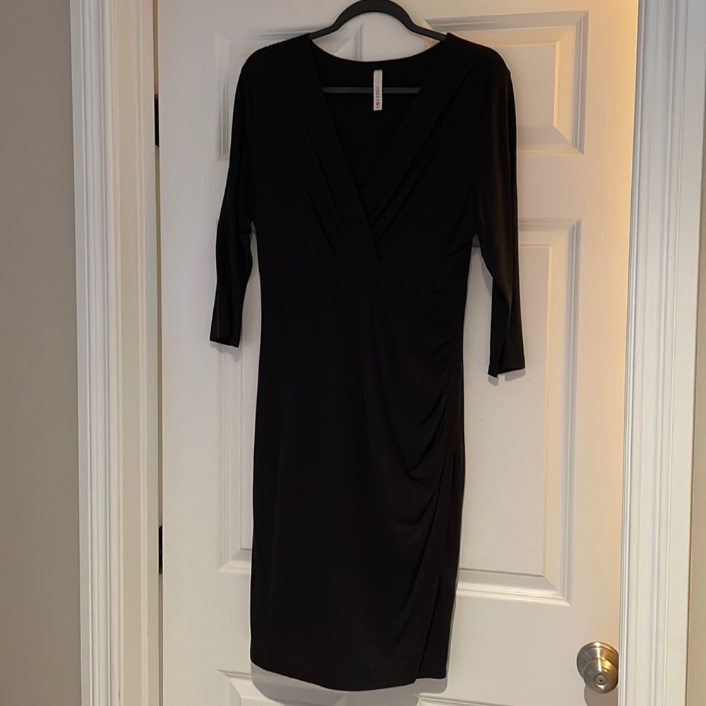 Beautiful dress can be dressed up or down. Dark blue.